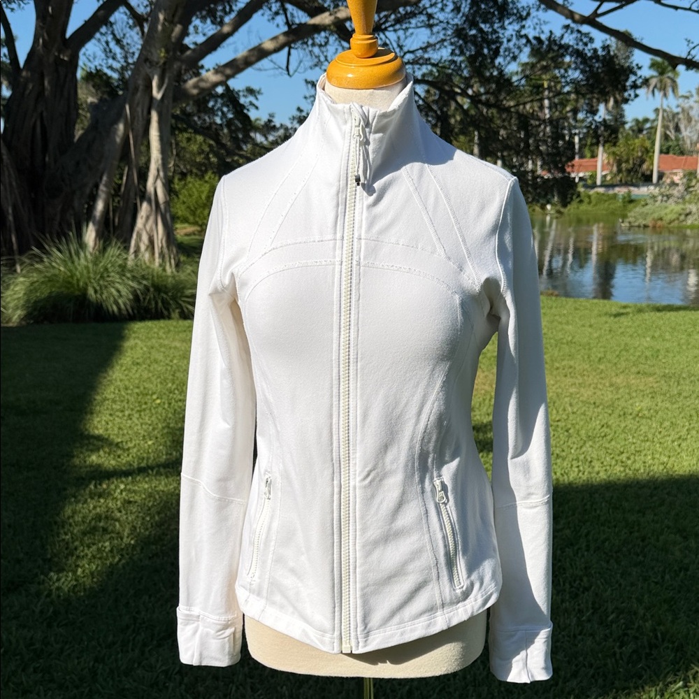 Lululemon original white define jacket .With original toe lulu fob